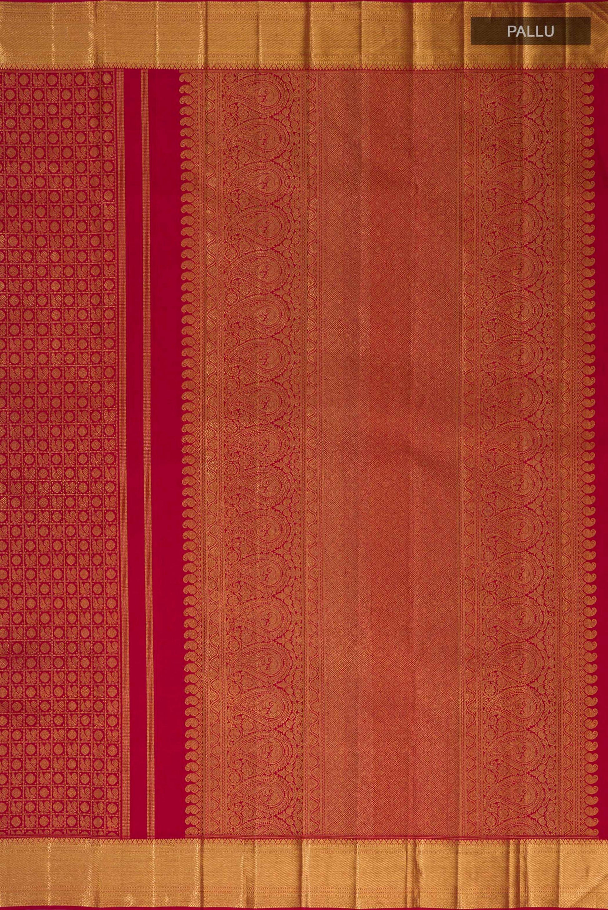 Close up image of the pallu of Maroon Kanchipuram Silk Saree with Zari Brocade on the body and Zari Border. 