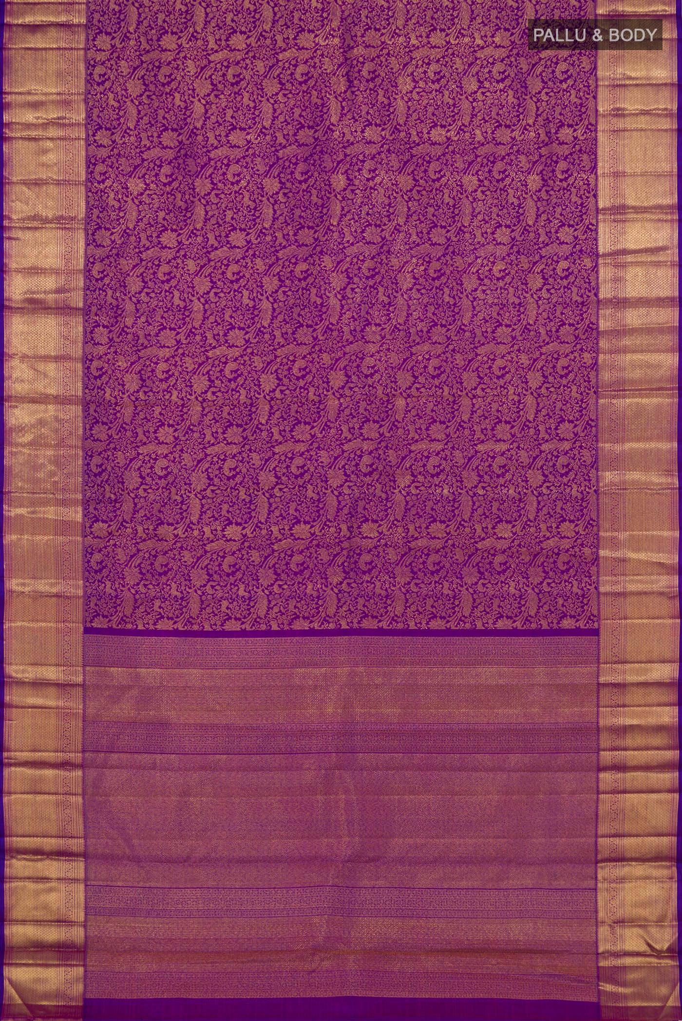 Flat view of Pure Silk Pure Zari Purple Kanchipuram Saree with Zari Brocade on the body and Zari Border. 