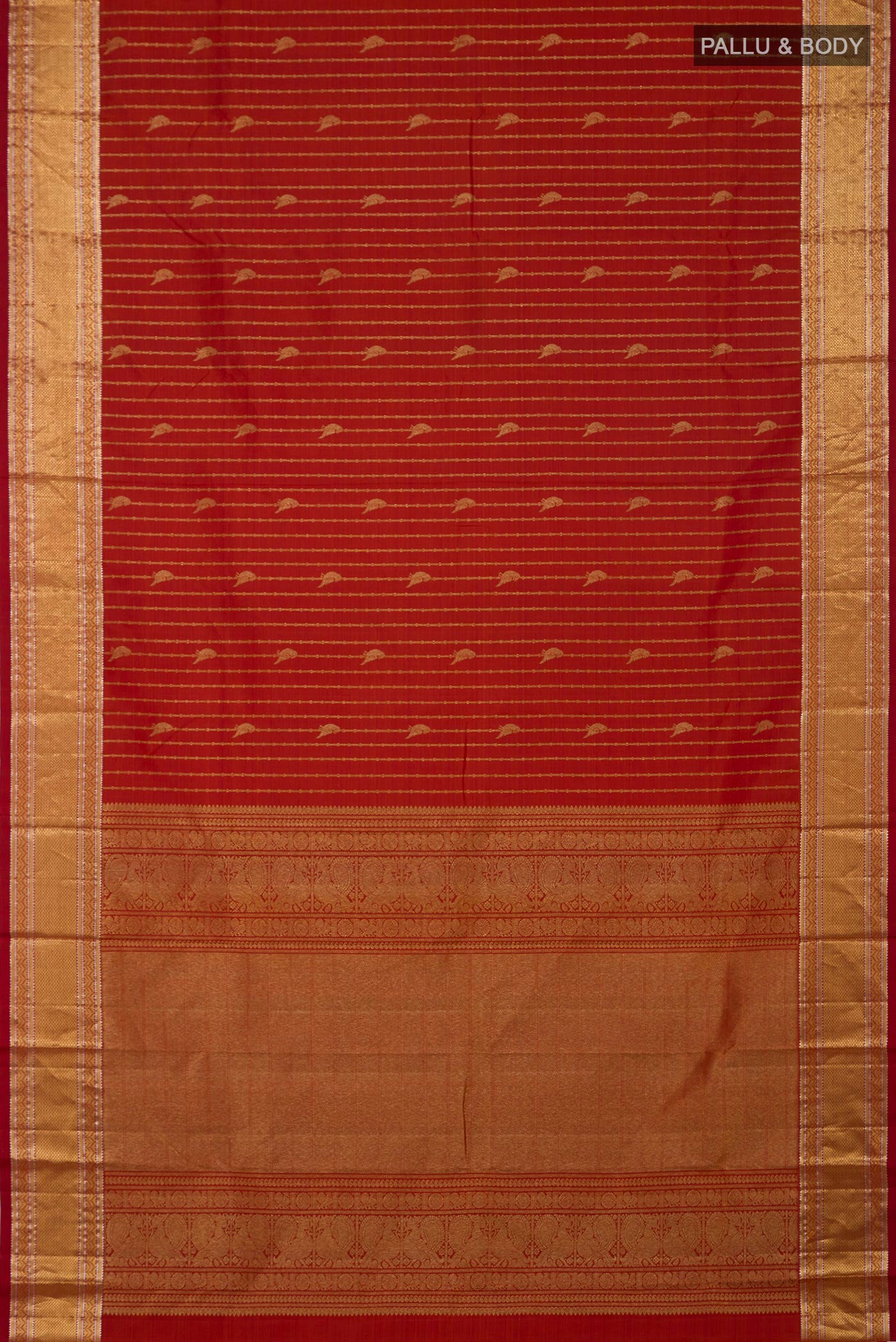 Flat view of Rust Kanchipuram Silk Saree with Stripes on the body and Zari Border. 