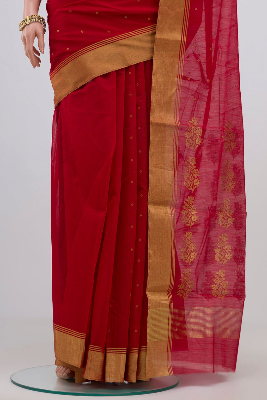 Pleats and pallu of Red Chanderi Silk Cotton Saree with Zari Butta on the body and Zari Border. 