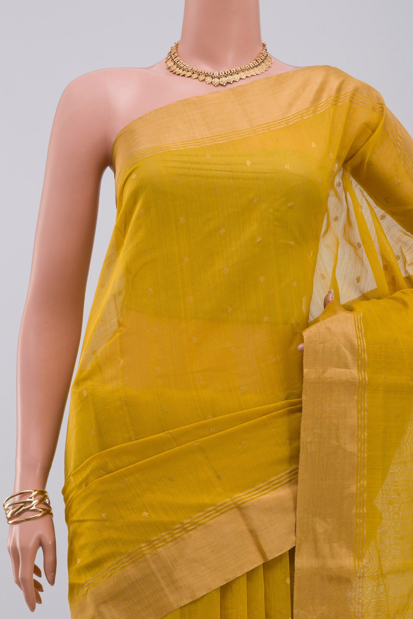 Border image of Yellow Chanderi Silk Cotton Saree with Zari Butta on the body and Zari Border. 