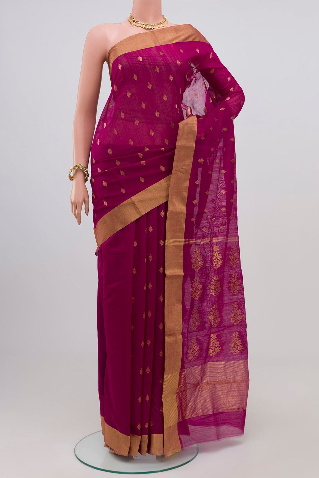 Purple Chanderi Silk Cotton Saree with Zari Butta on the body and Zari Border.  displayed on a mannequin