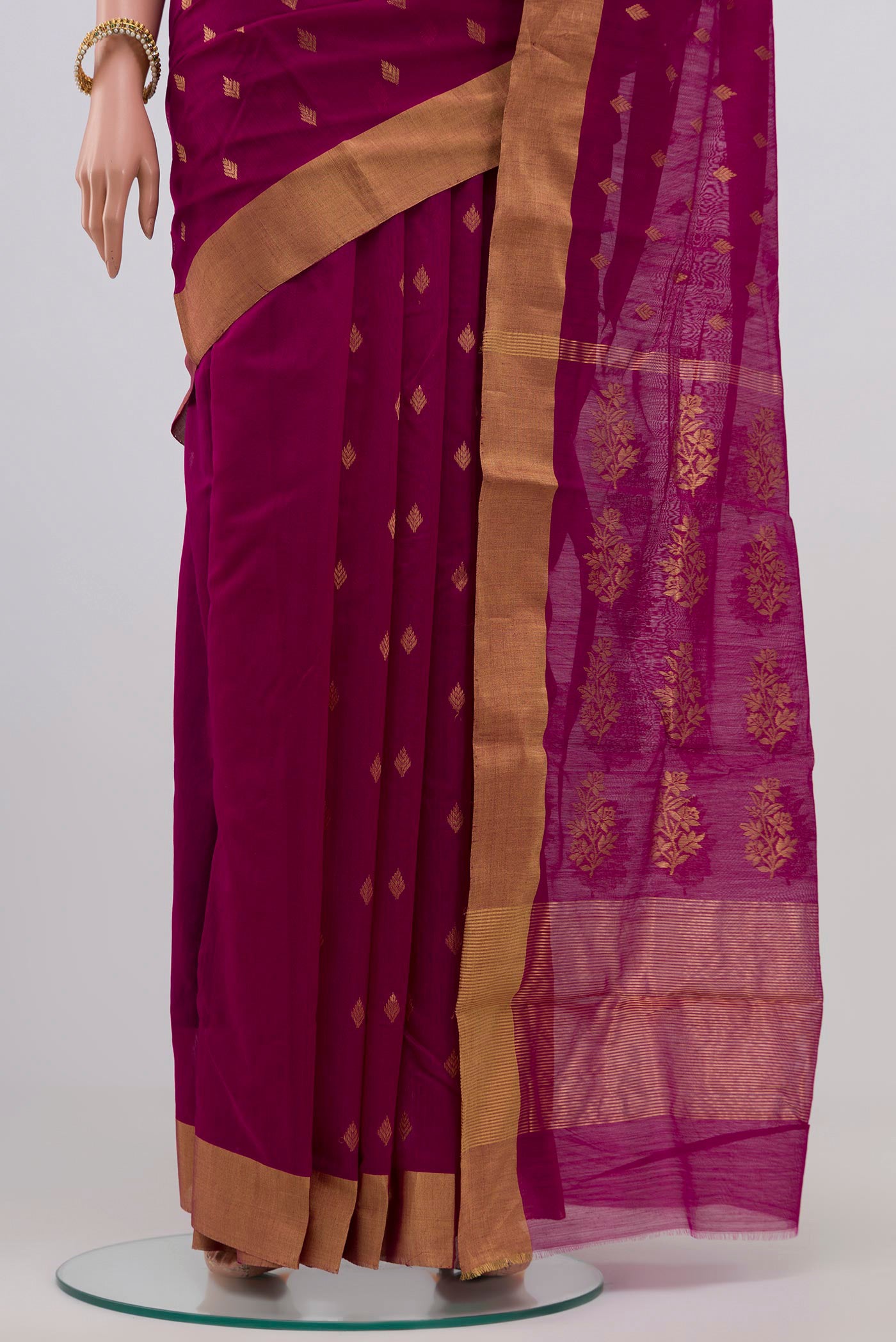 Pleats and pallu of Purple Chanderi Silk Cotton Saree with Zari Butta on the body and Zari Border. 