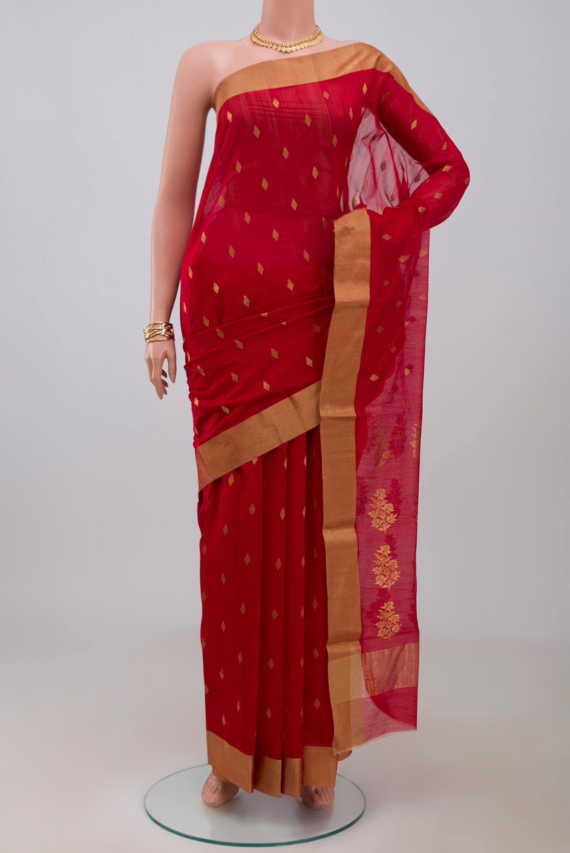 Red Chanderi Silk Cotton Saree with Zari Butta on the body and Zari Border.  displayed on a mannequin