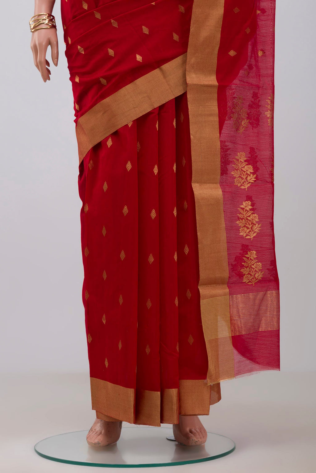 Pleats and pallu of Red Chanderi Silk Cotton Saree with Zari Butta on the body and Zari Border. 