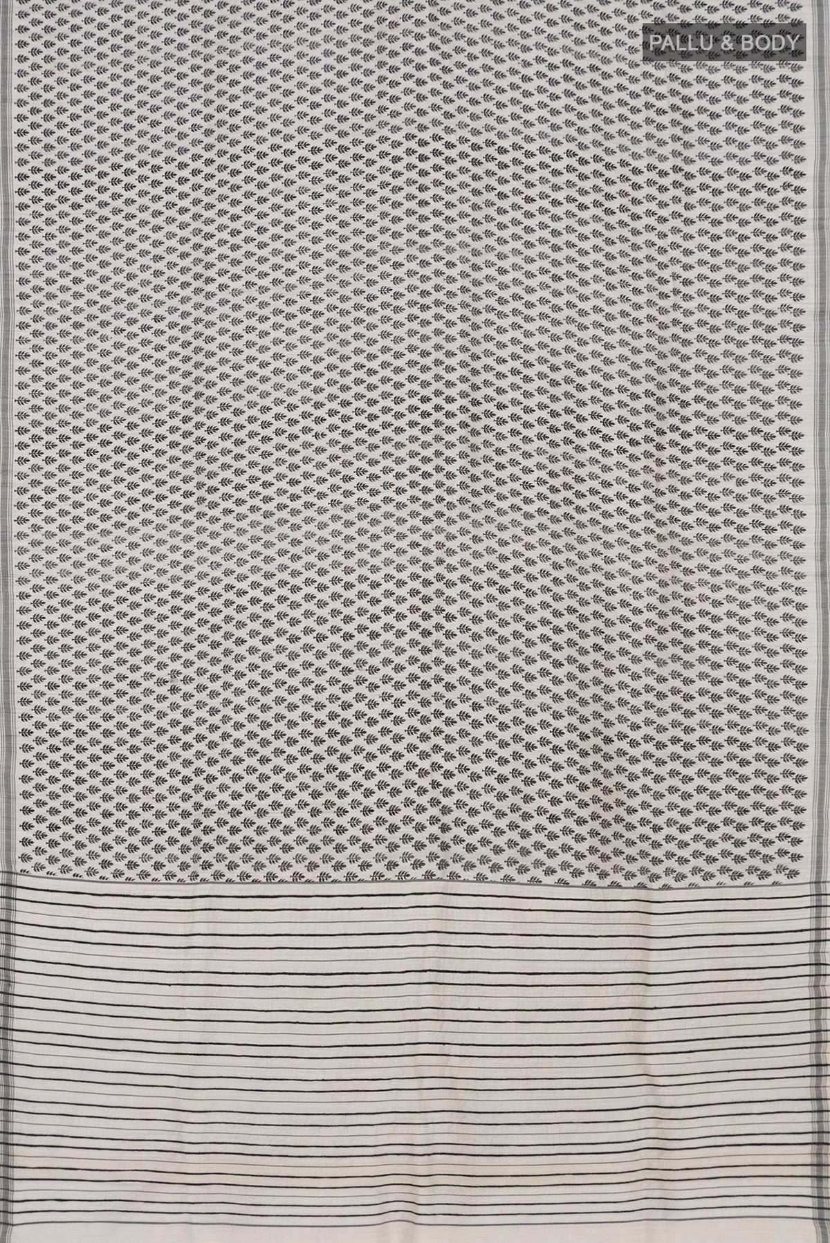 Flat view of White Tussar Silk Saree with Printed design on the body and Plain Border. 