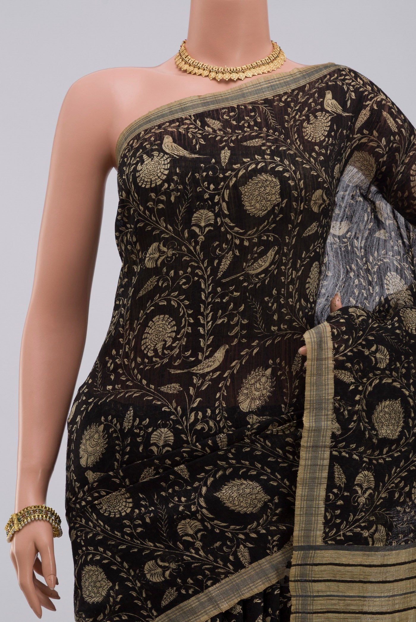 Border image of Black Jute Silk Saree with Fancy on the body and Without Border. 