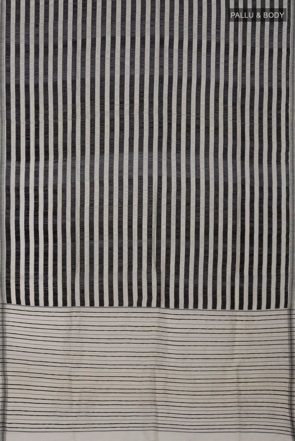 Flat view of Black Jute Silk Saree with Fancy on the body and Without Border. 