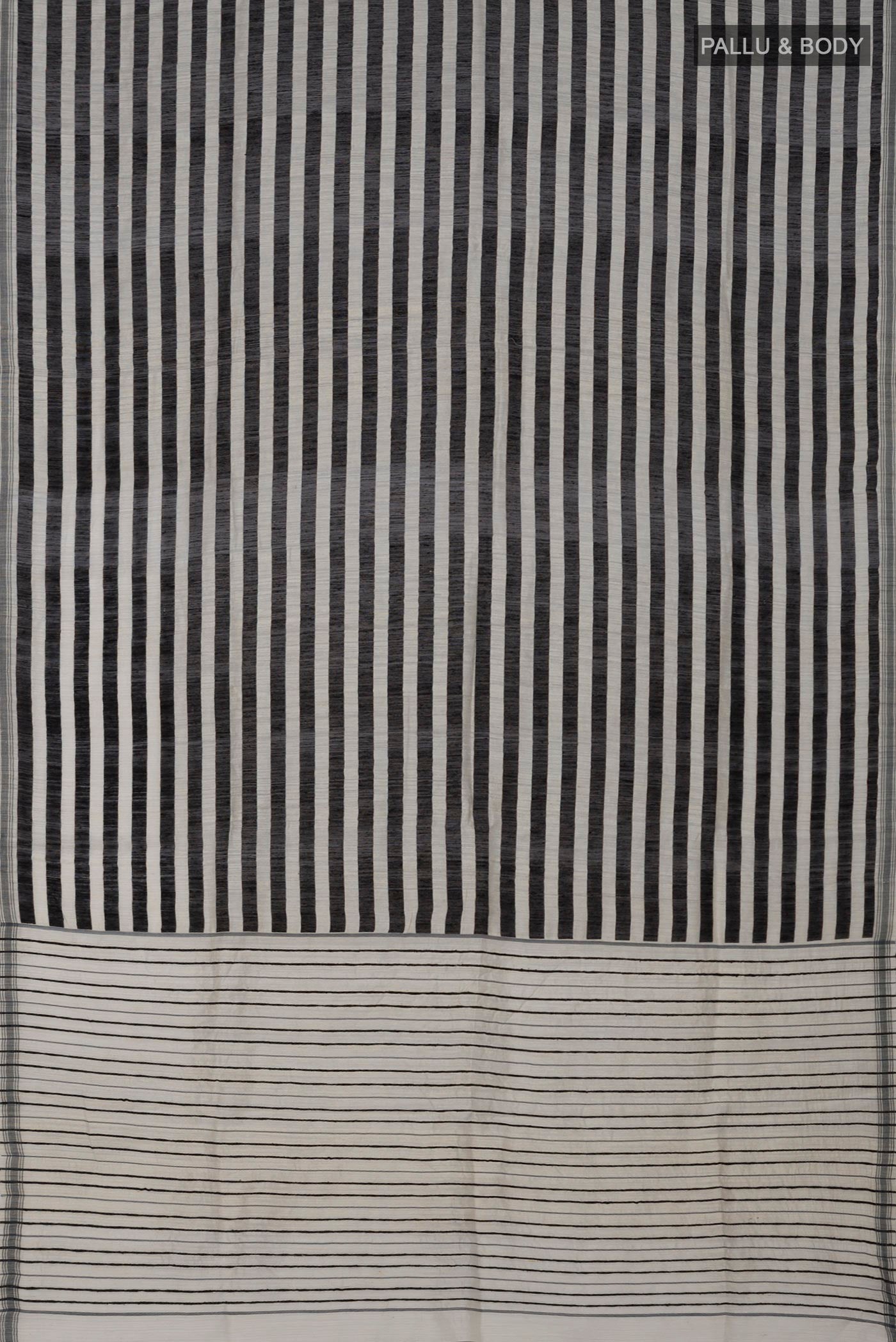Flat view of Black Jute Silk Saree with Fancy on the body and Without Border. 