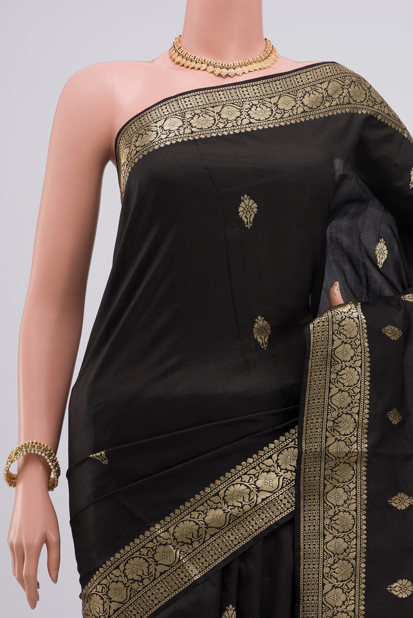 Border image of Black Banarasi Katan Silk Saree with Zari Butta on the body and Zari Border. 
