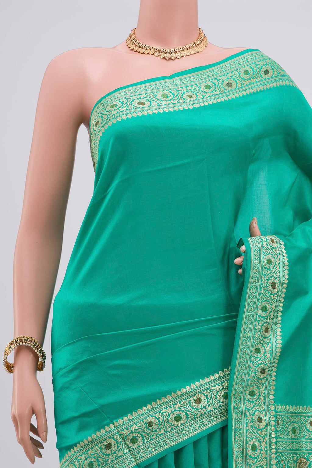 Border image of Light Green Banarasi Katan Silk Saree with Plain Body and Thread Border. 