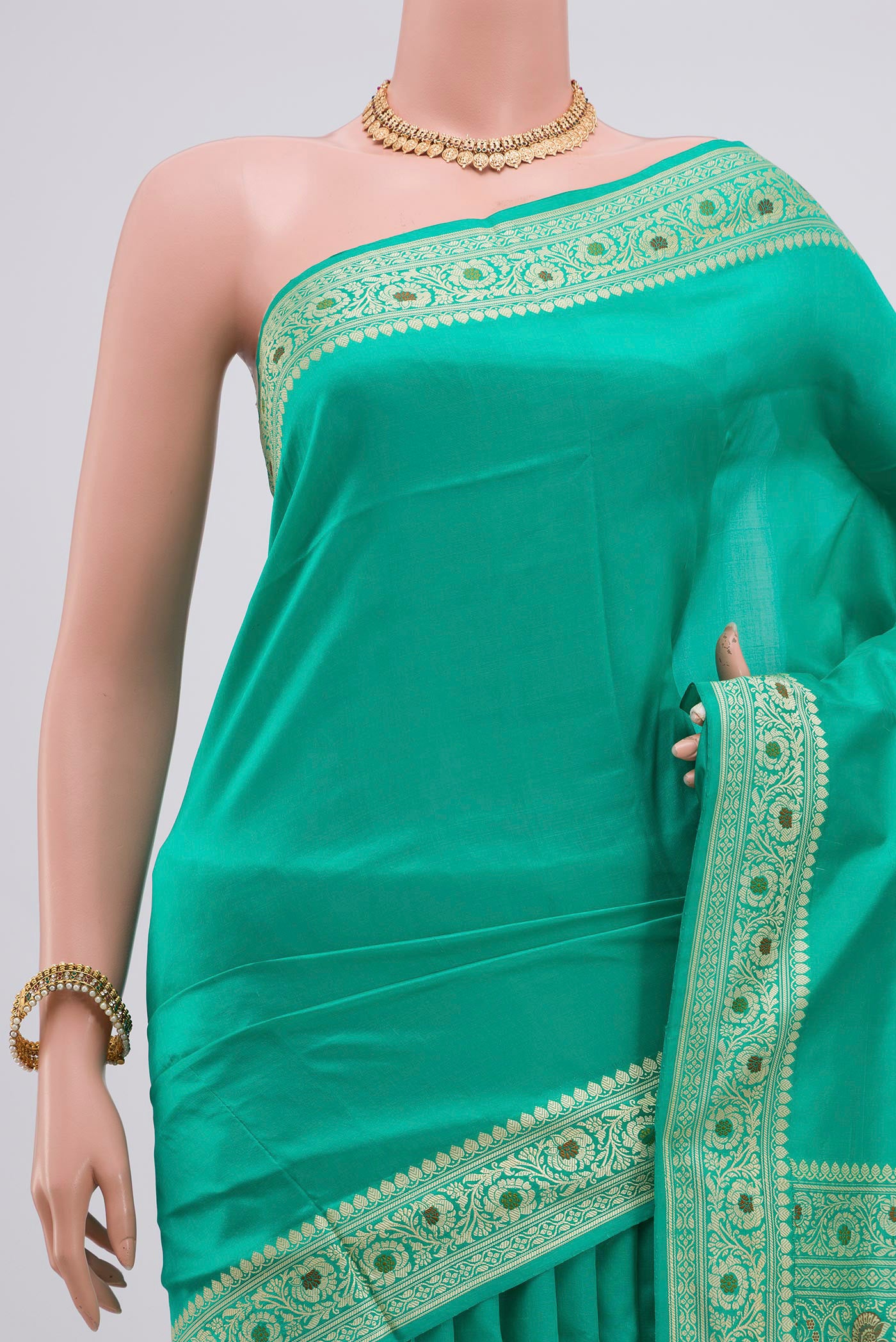 Border image of Light Green Banarasi Katan Silk Saree with Plain Body and Thread Border. 