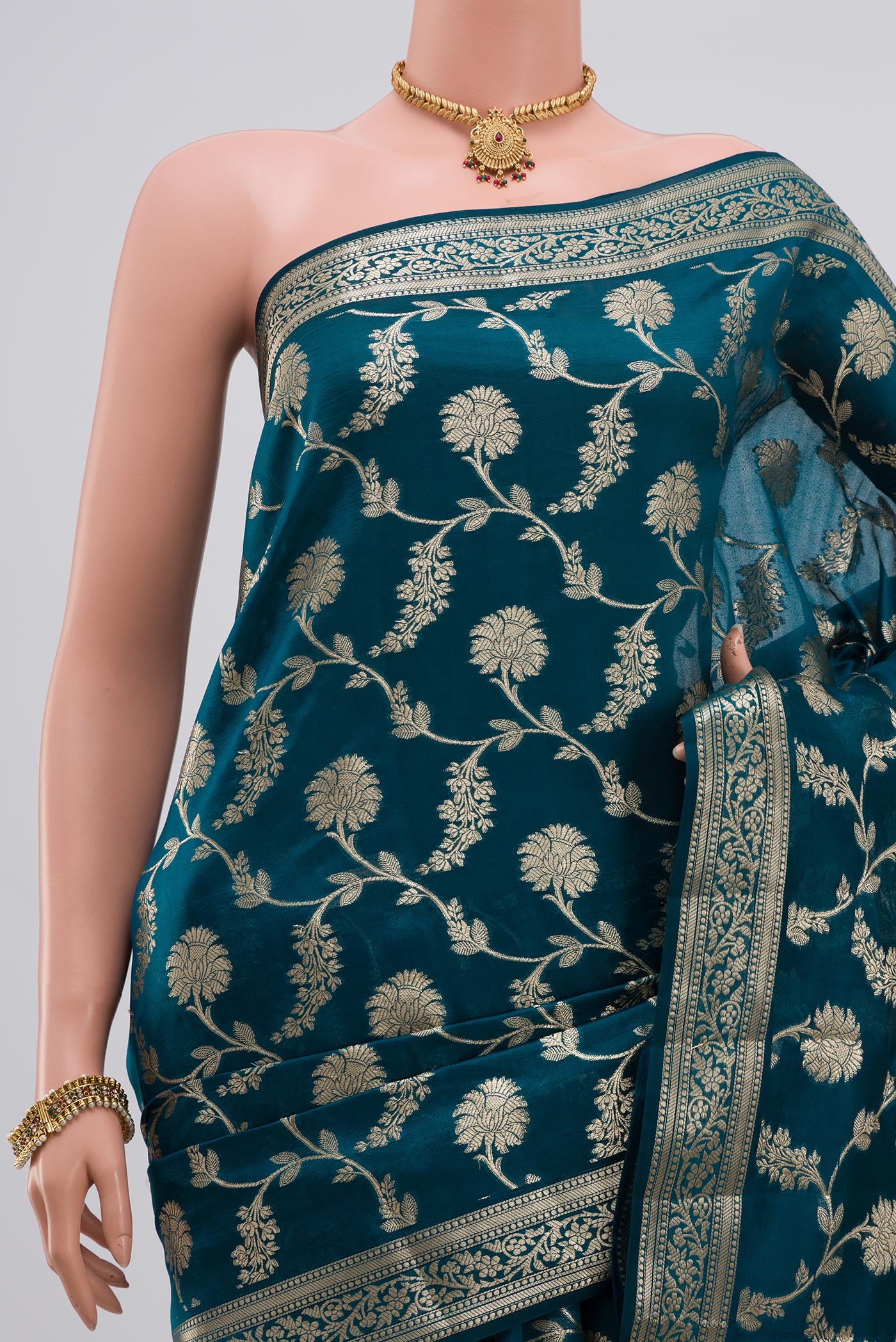 Border image of Blue Raw Silk Saree with Fancy on the body and Zari Border. 