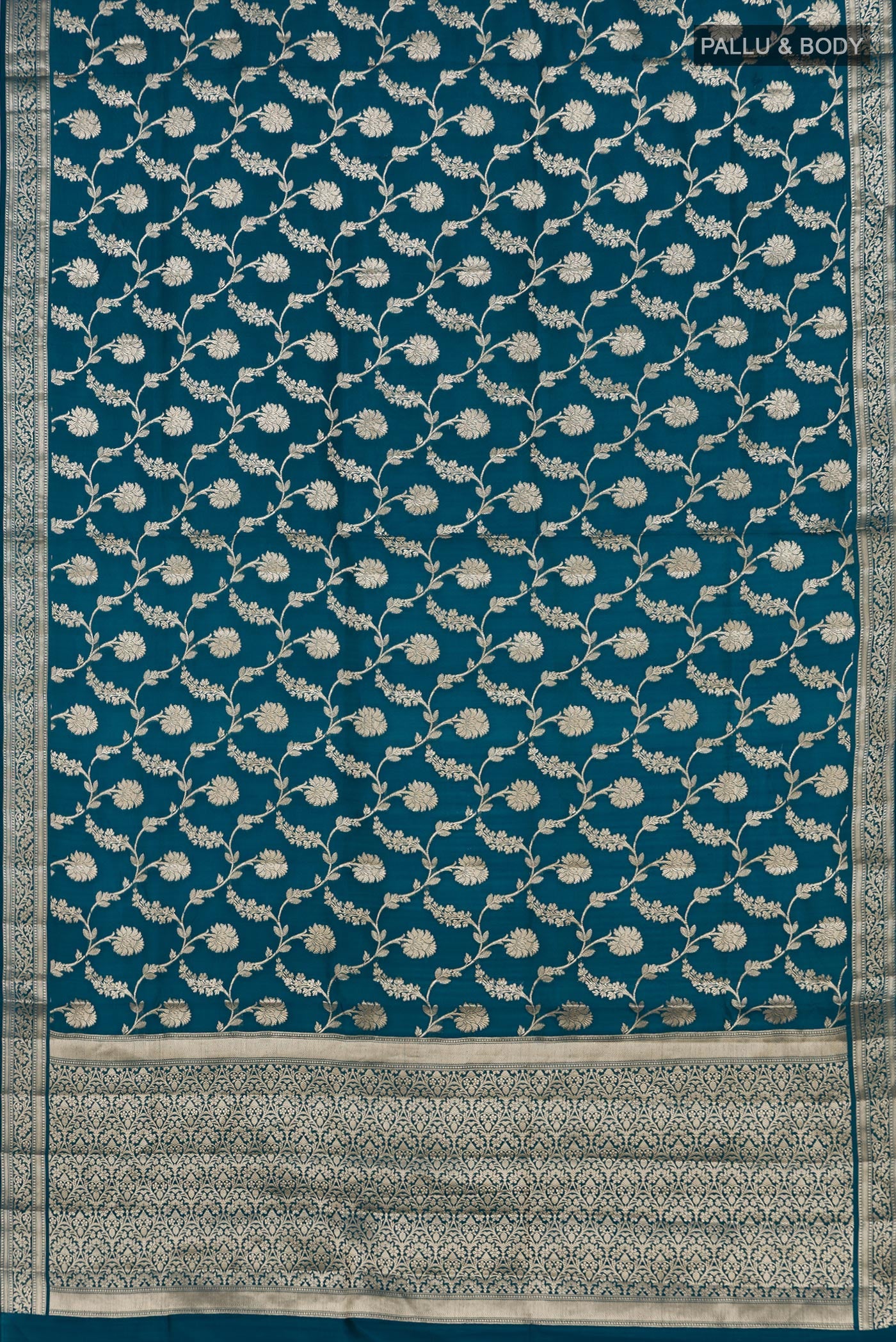 Flat view of Blue Raw Silk Saree with Fancy on the body and Zari Border. 