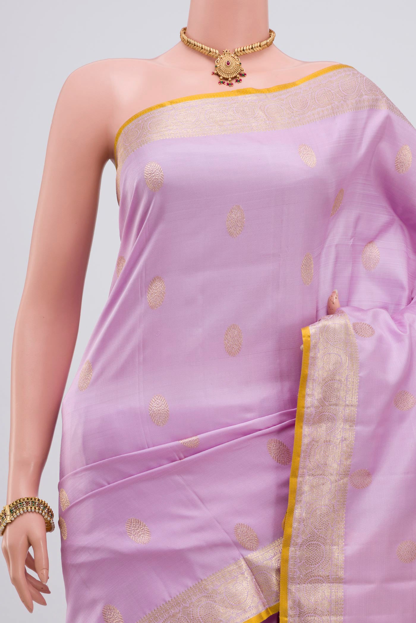 Border image of Lavender Kanjivaram Silk Saree with Zari Butta on the body and Zari Border. 