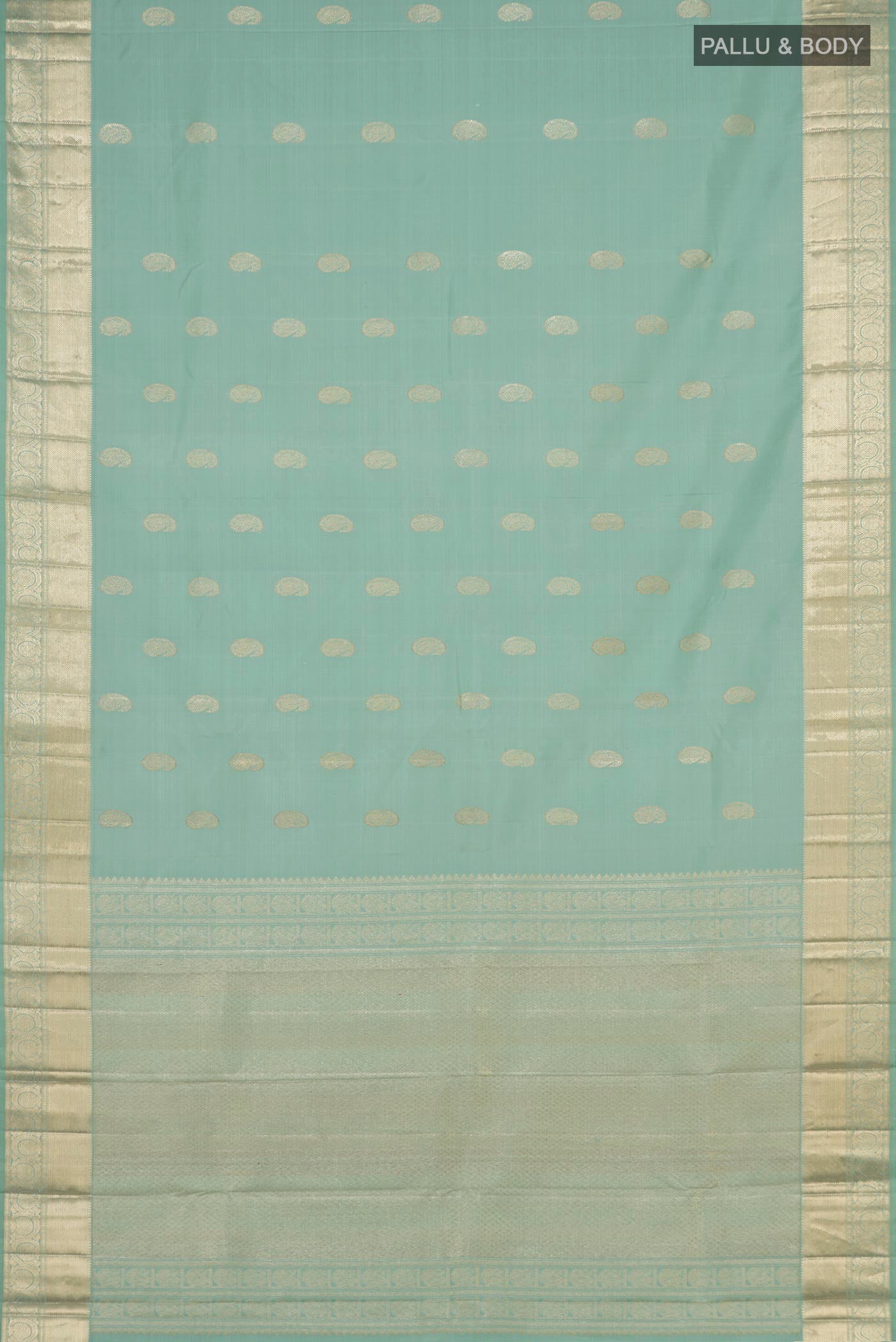 Flat view of Green Kanjivaram Saree with Zari Butta on the body and Zari Border. 