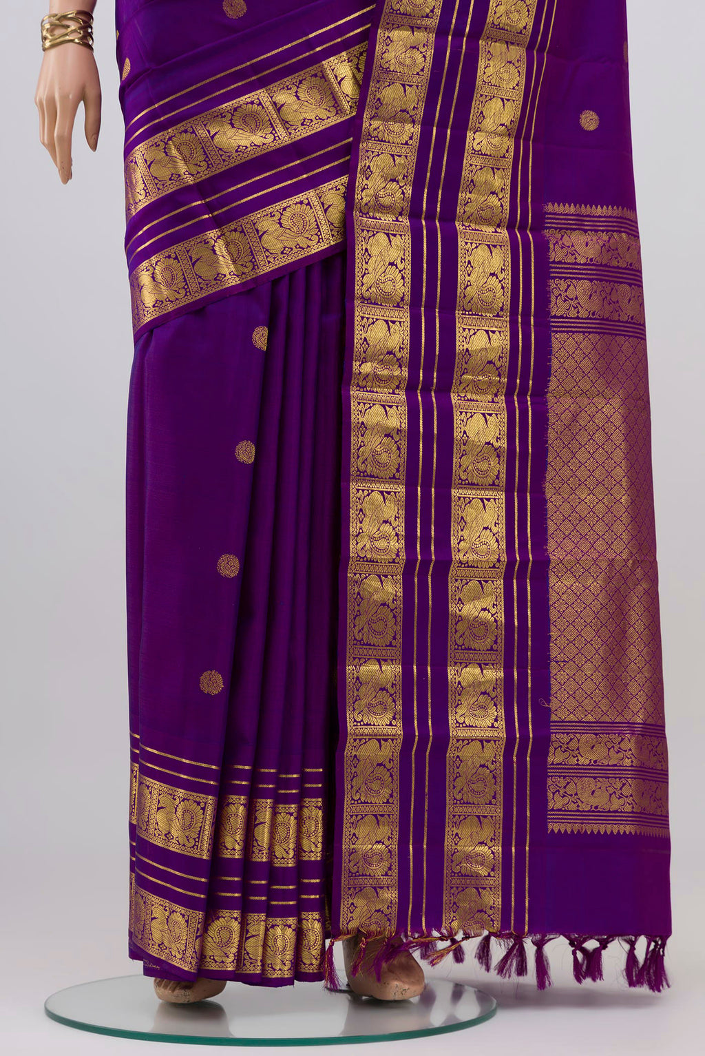 Pleats and pallu of Violet Kanjivaram Silk Saree with Zari Butta on the body and Zari Border. 