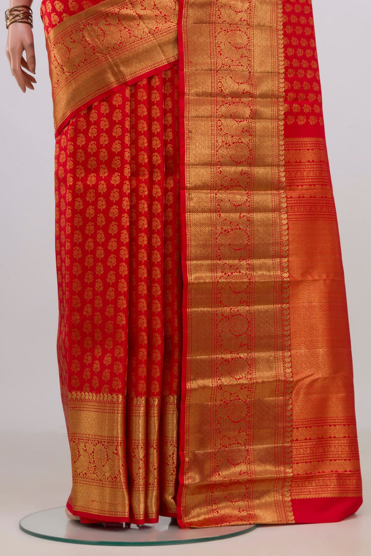 Pleats and pallu of Pure Silk Red Kanchipuram Saree with Zari Brocade on the body and Zari Border. 