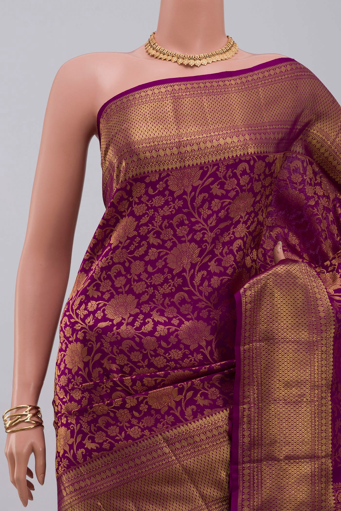 Border image of Purple Kanchipuram Silk Saree with Zari Brocade on the body and Zari Border. 