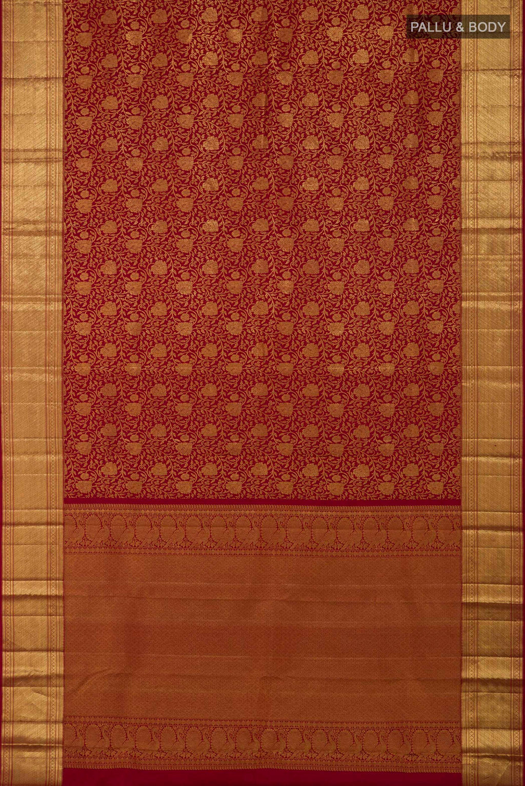 Flat view of Maroon Kanchipuram Saree with Zari Brocade on the body and Zari Border. 