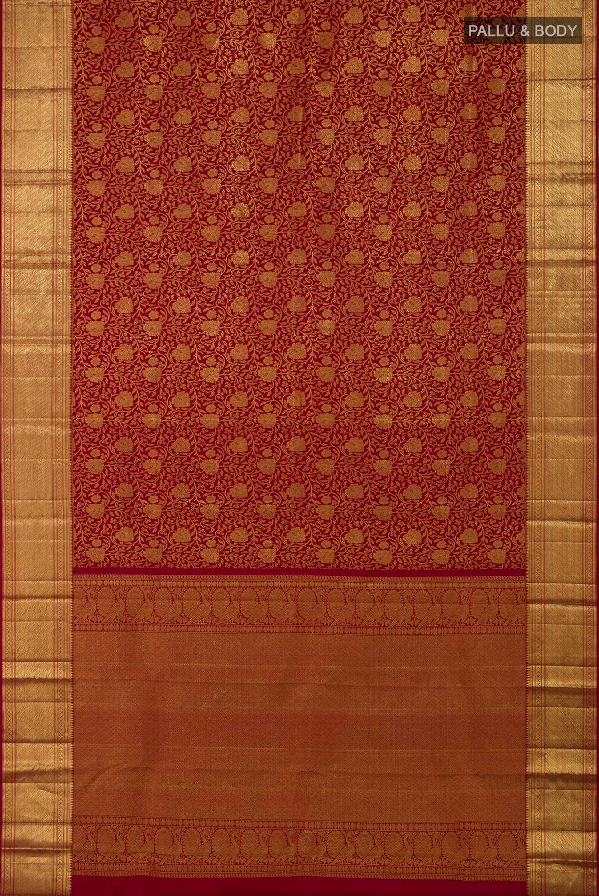 Flat view of Maroon Kanchipuram Saree with Zari Brocade on the body and Zari Border. 