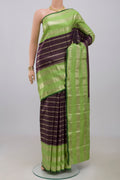 Purple Kanchipuram Silk Saree with Stripes on the body and Zari Border.  displayed on a mannequin