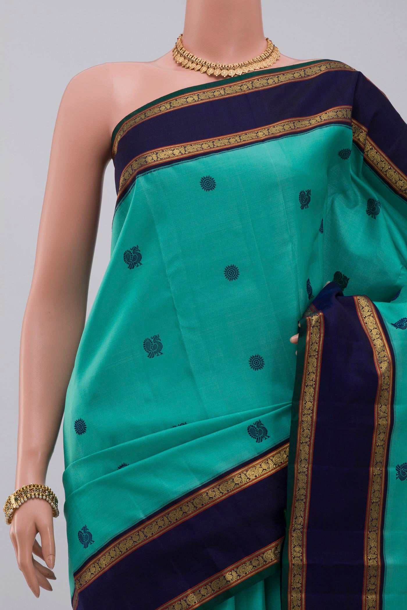 Border image of Pure Silk Pure Zari Light Blue Kanchipuram Saree with Thread Butta on the body and Zari Border. 