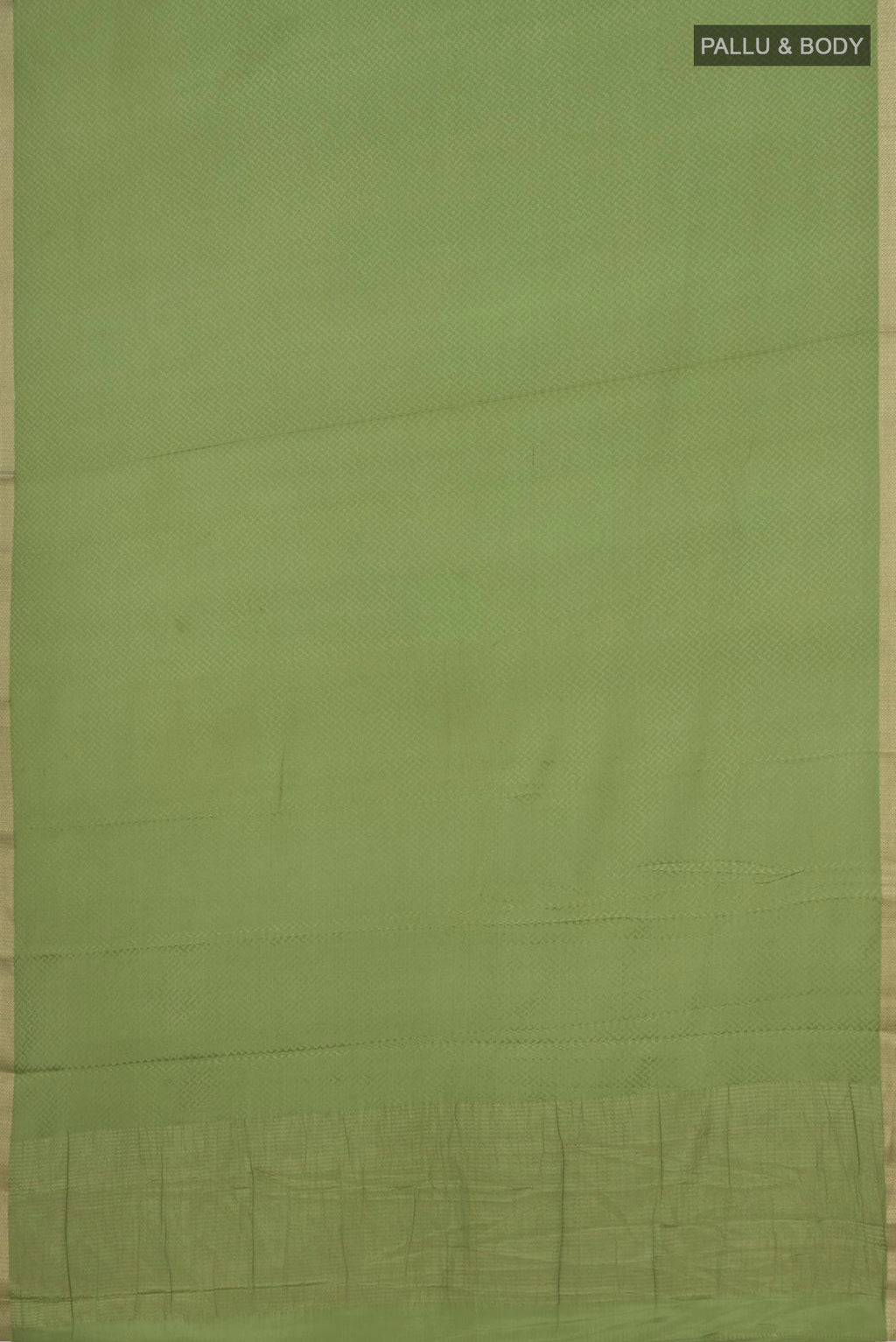 Flat view of Green Mysore Crepe Saree with Jacquard design on the body and Zari Border. 