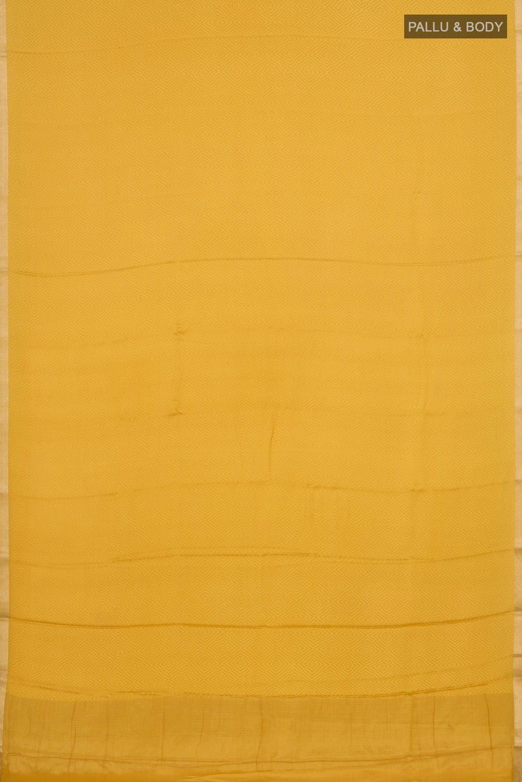 Flat view of Yellow Crepe Saree with Jacquard design on the body and Thin Zari Line. 