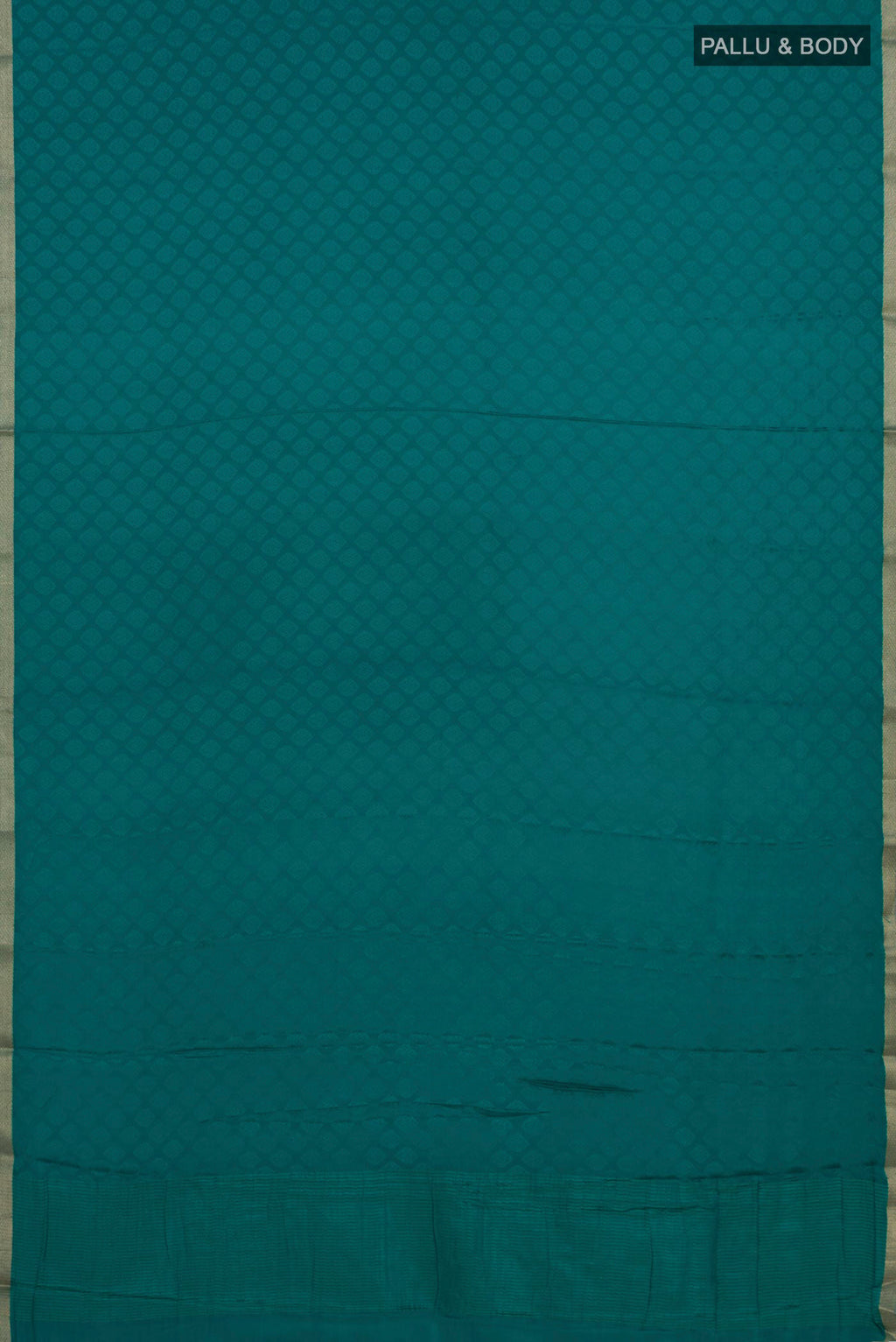 Flat view of Teal Mysore Crepe Saree with Jacquard design on the body and Zari Border. 