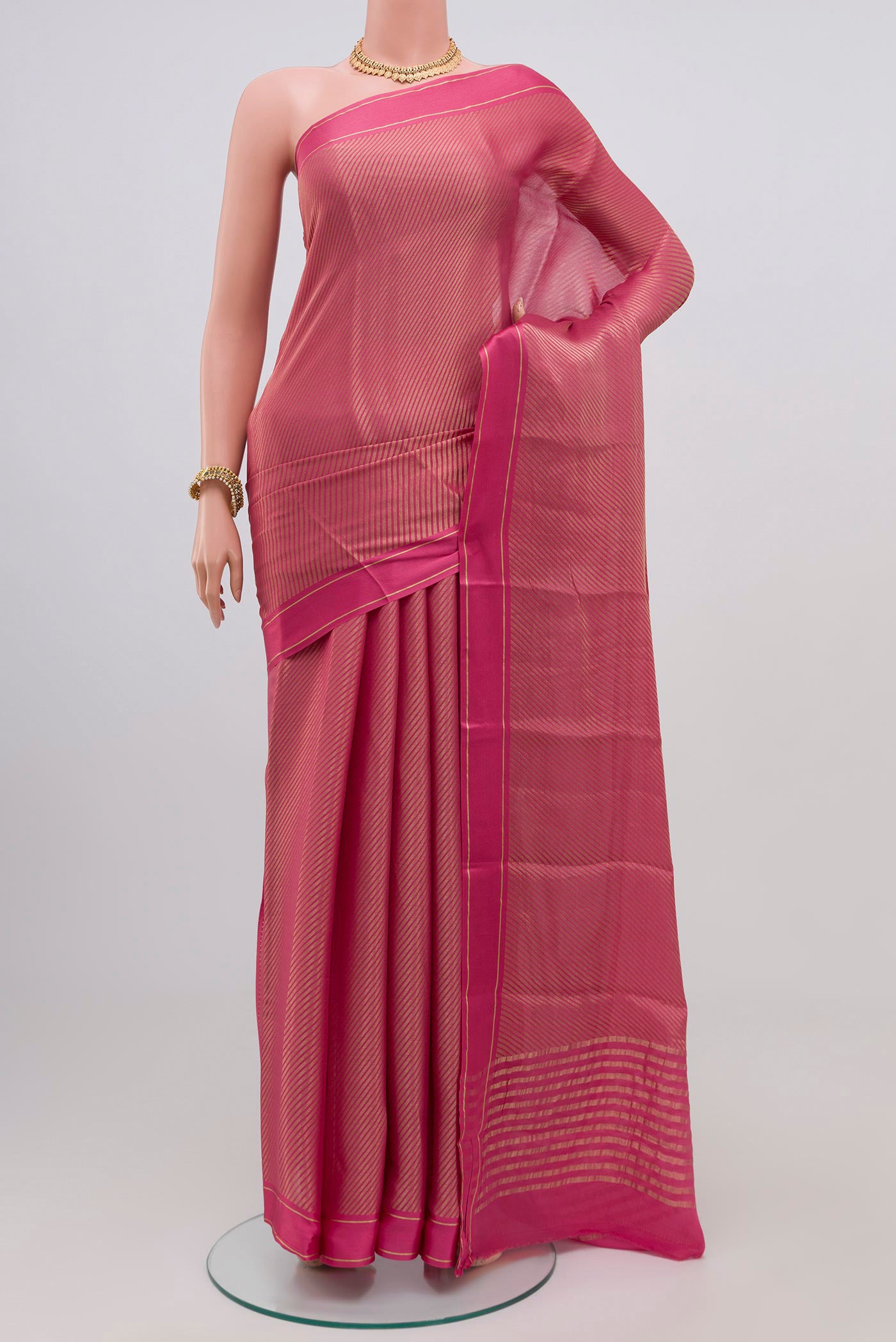 Pink Mysore Georgette Saree with Zari Brocade on the body and Plain Border.  displayed on a mannequin