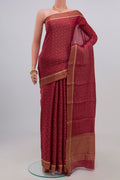 Pink Georgette Saree with Zari Brocade on the body and Zari Border.  displayed on a mannequin
