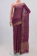 Purple Georgette Saree with Zari Brocade on the body and Zari Border.  displayed on a mannequin