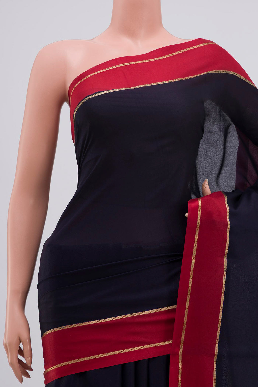 Border image of Navy Blue Mysore Crepe Saree with Plain Body and Zari Border. 