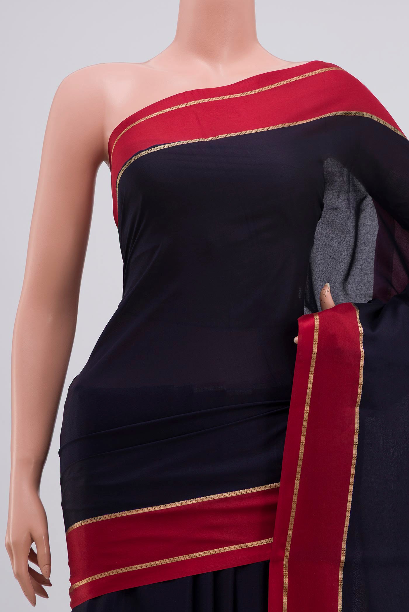 Border image of Navy Blue Mysore Crepe Saree with Plain Body and Zari Border. 