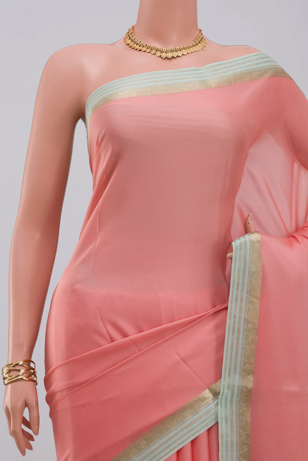 Border image of Pink Crepe Saree with Plain Body and Fancy Border. 