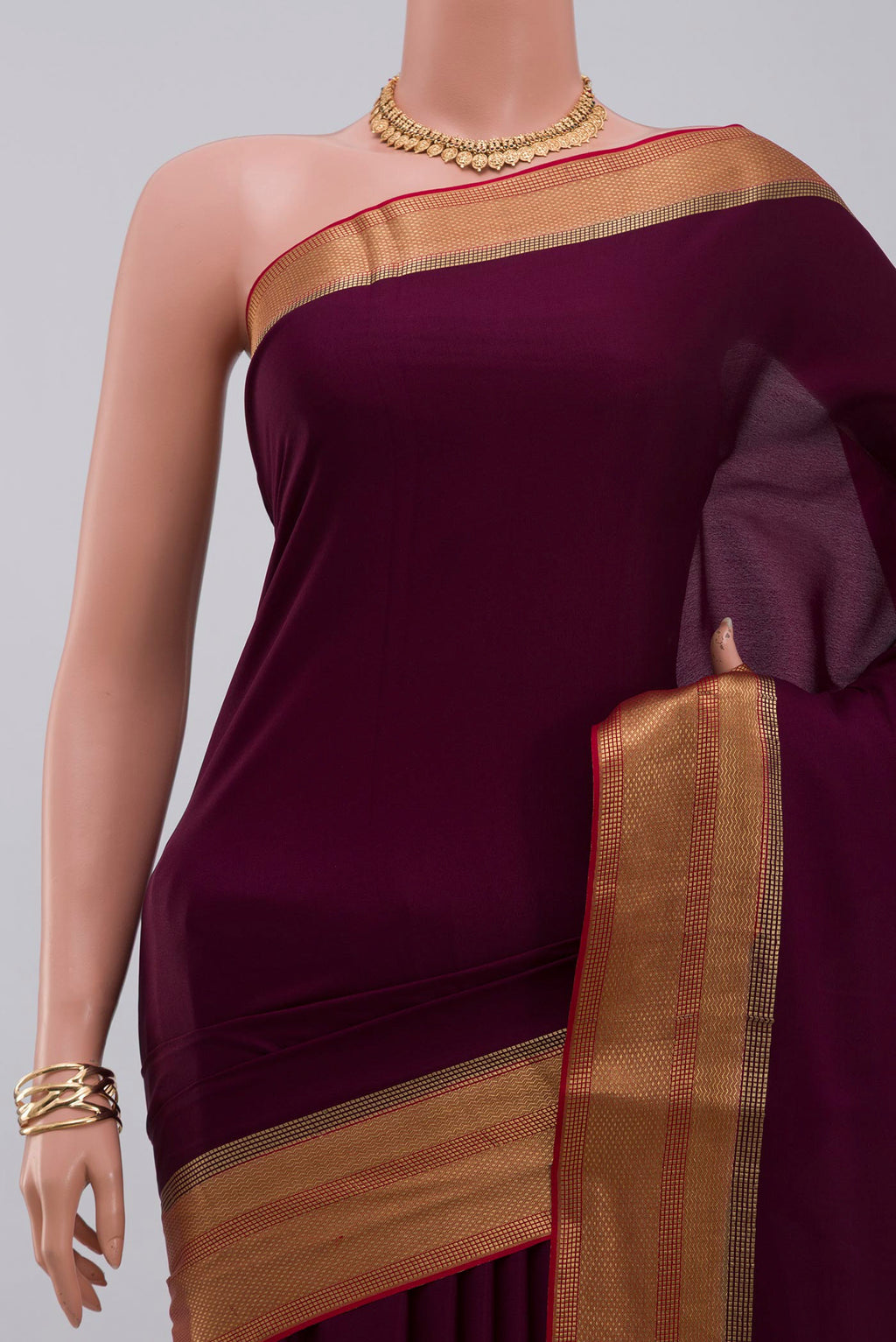 Border image of Purple Crepe Saree with Plain Body and Zari Border. 