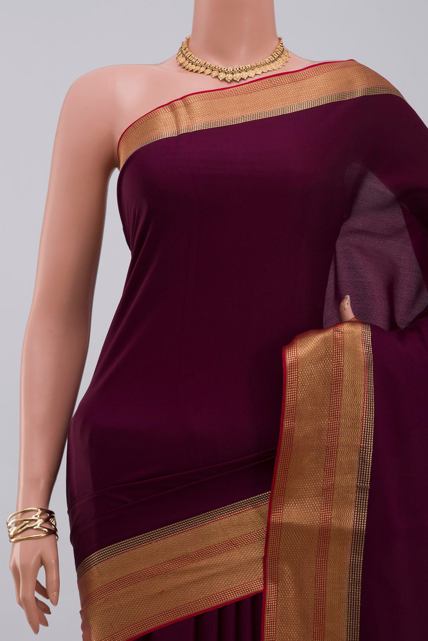 Border image of Purple Crepe Saree with Plain Body and Zari Border. 