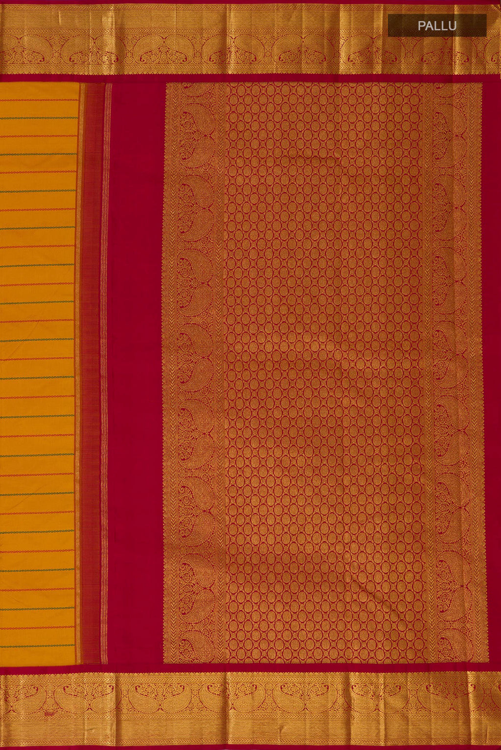 Close up image of the pallu of Yellow Kanjivaram Silk Saree with Veldhari on the body and Zari Border. 