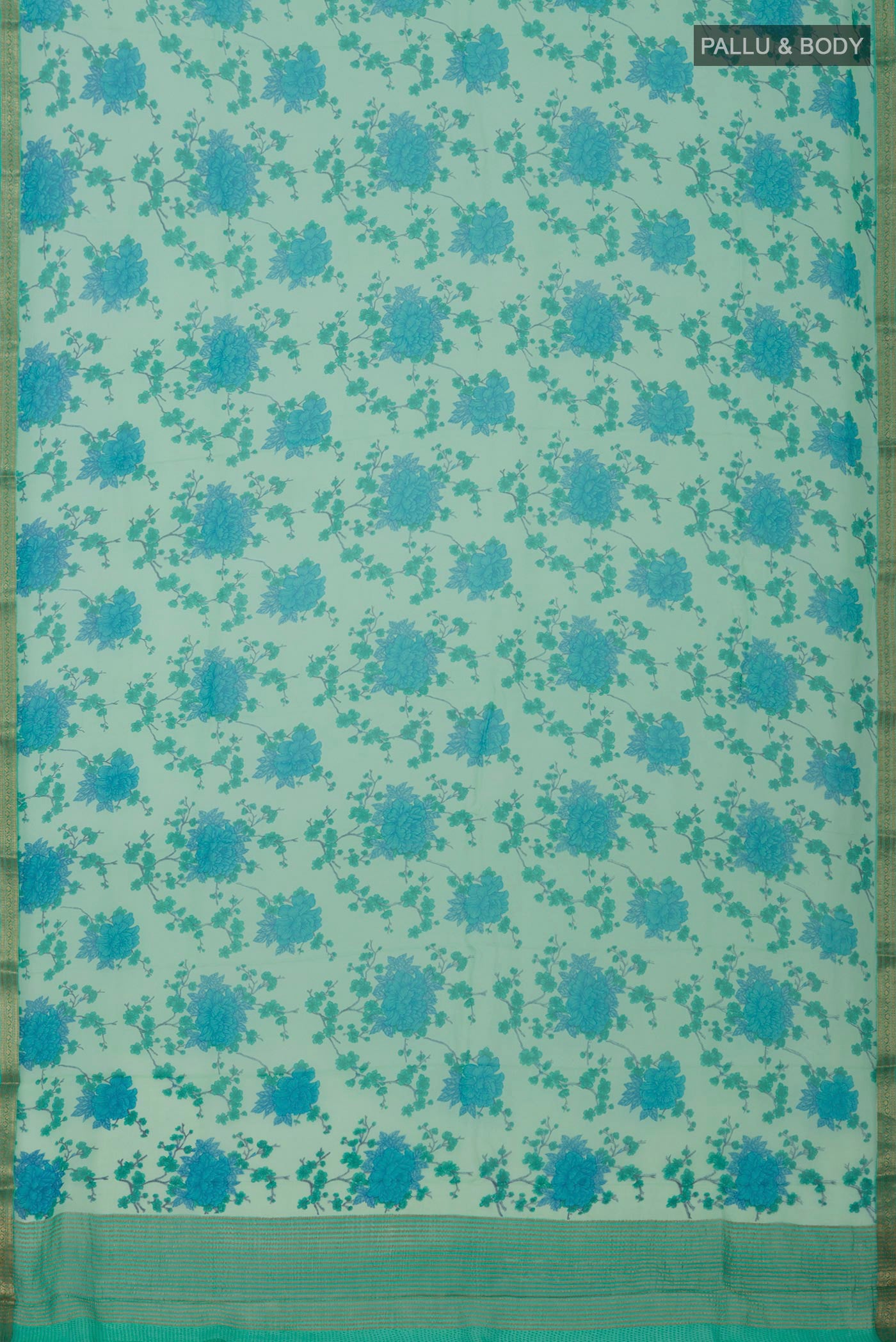 Flat view of Pista Green Chiffon Saree with Printed design on the body and Zari Border. 