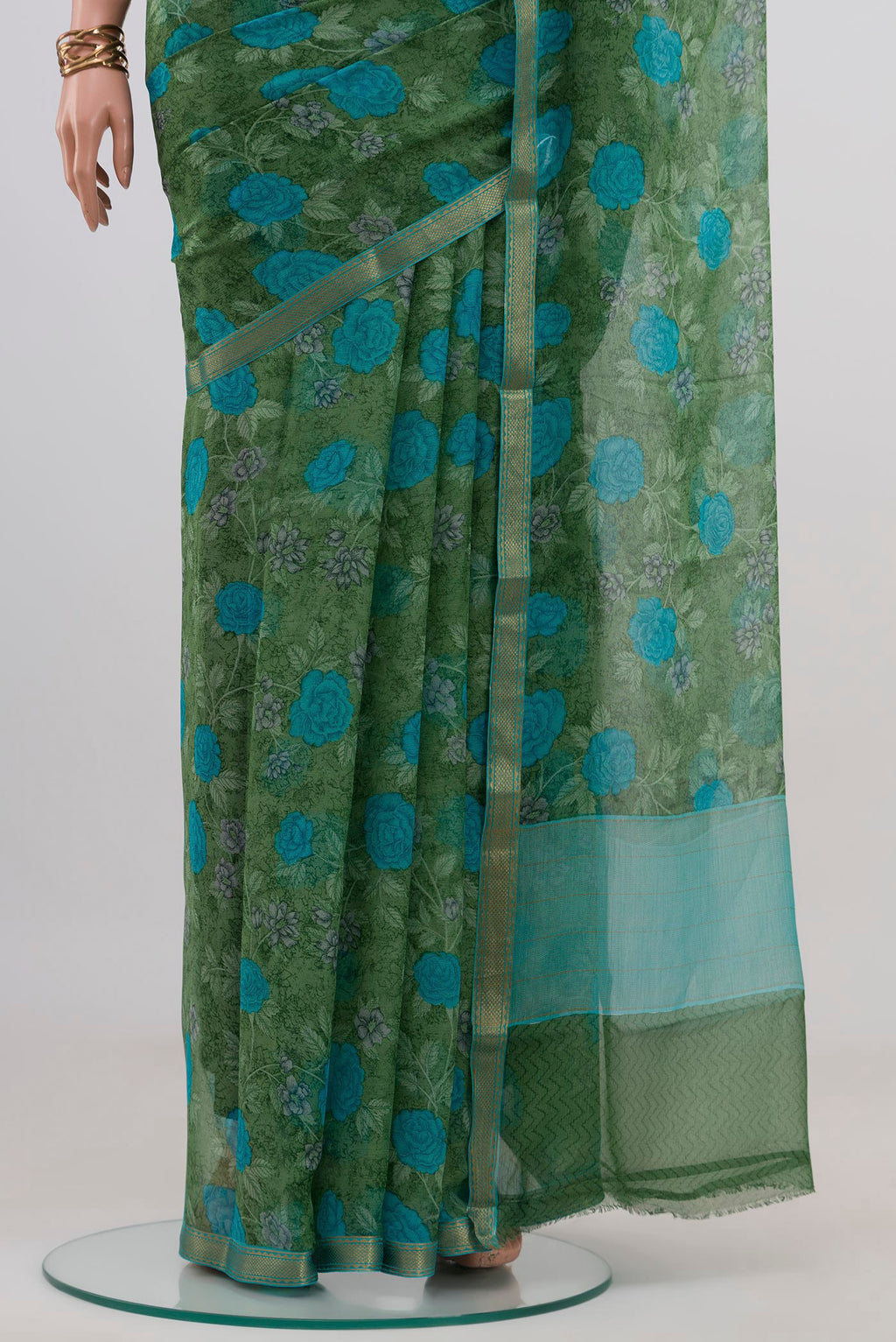 Pleats and pallu of Green Mysore Chiffon Saree with Floral Print on the body and Zari Border. 