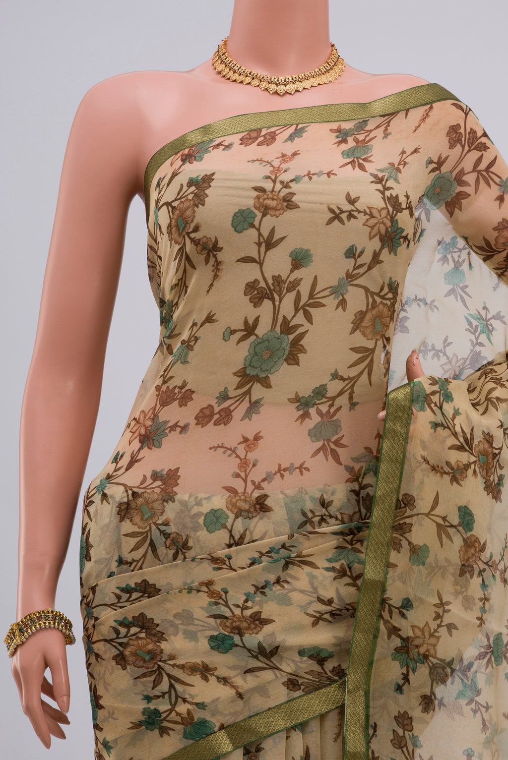 Border image of Cream Chiffon Saree with Printed design on the body and Zari Border. 