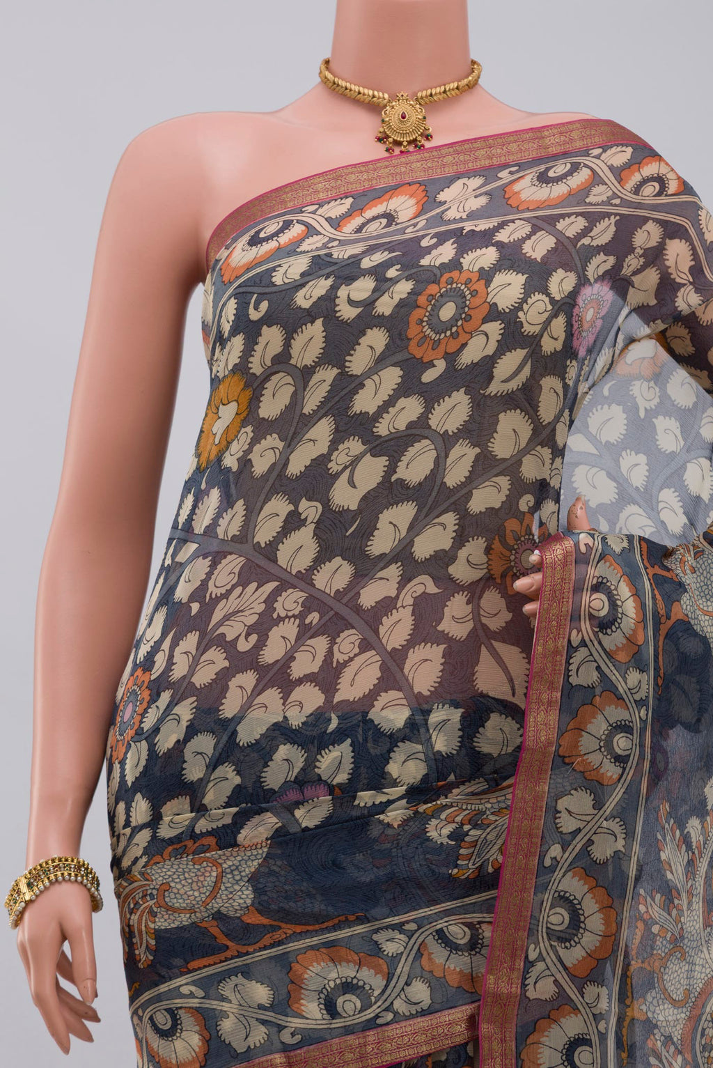 Border image of Blue Chiffon Saree with Printed design on the body and Thin Zari Line. 
