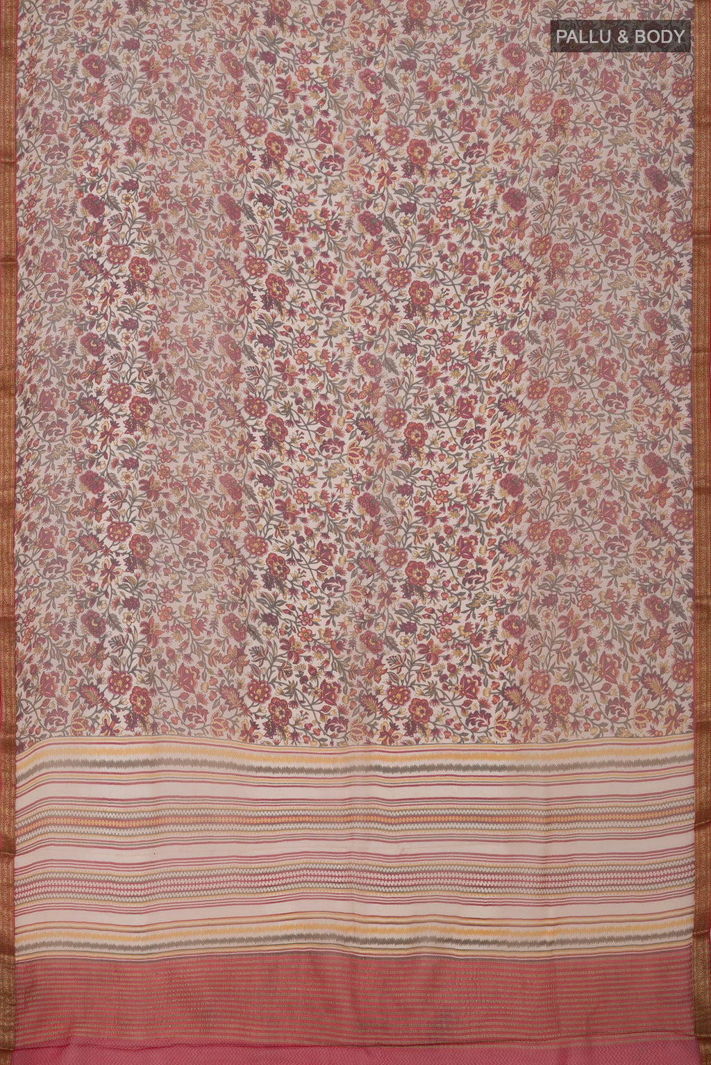 Flat view of Cream Chiffon Saree with Printed design on the body and Zari Border. 