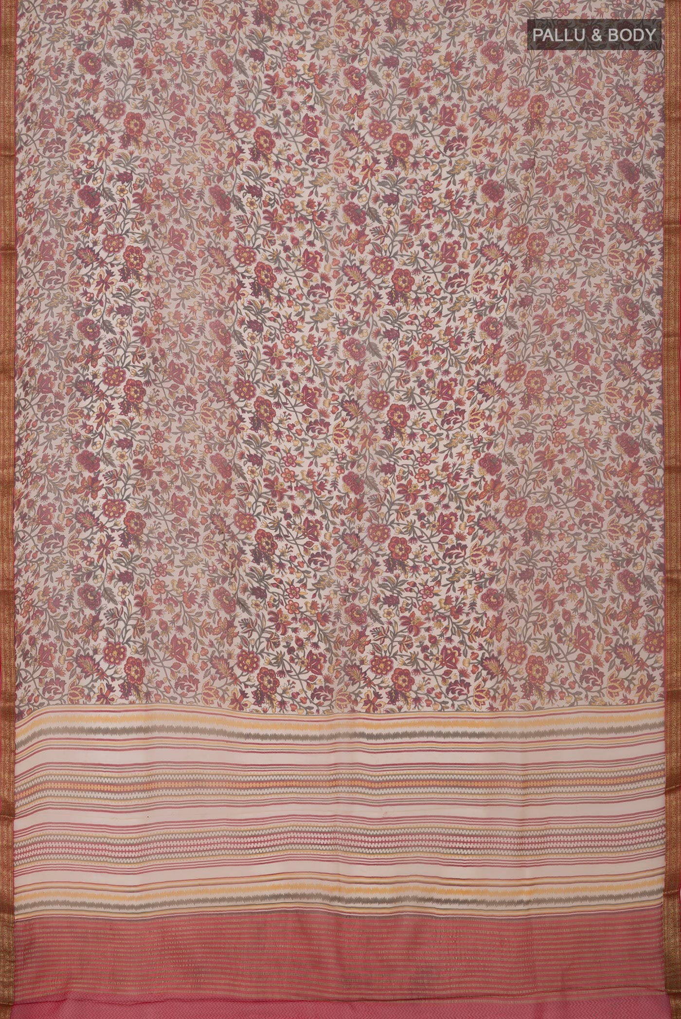 Flat view of Cream Chiffon Saree with Printed design on the body and Zari Border. 