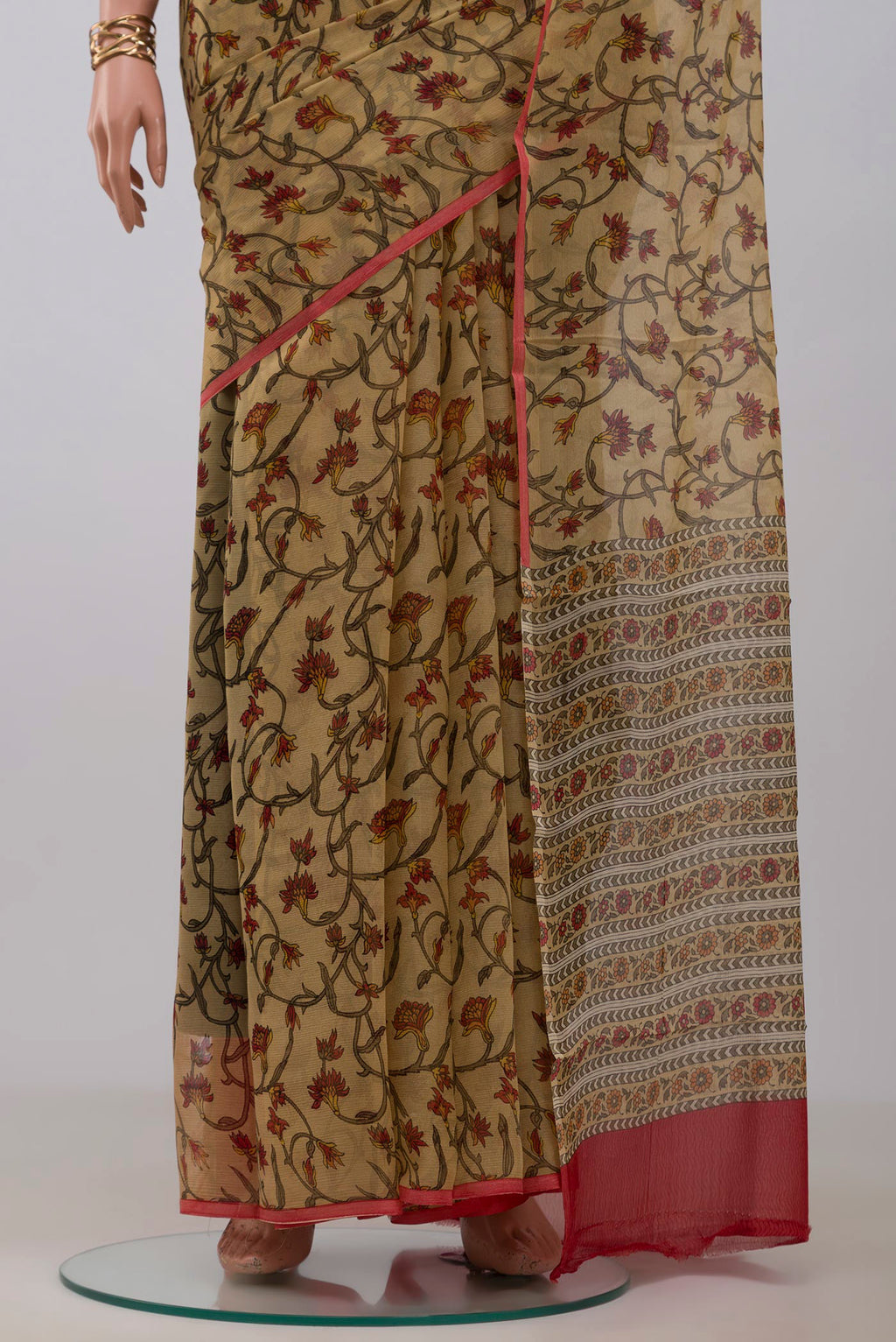 Pleats and pallu of Beige Mysore Chiffon Saree with Printed design on the body and Without Border. 