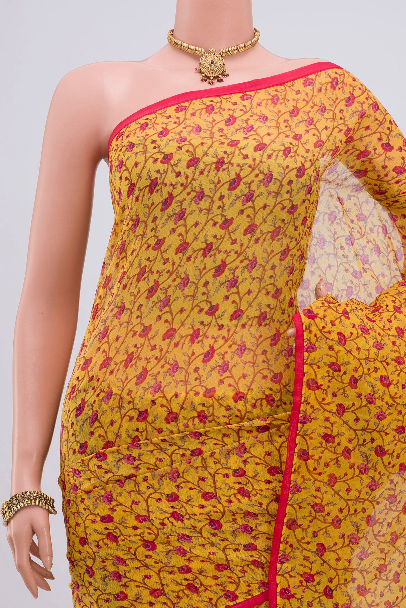 Border image of Yellow Chiffon Saree with Printed design on the body and Without Border. 