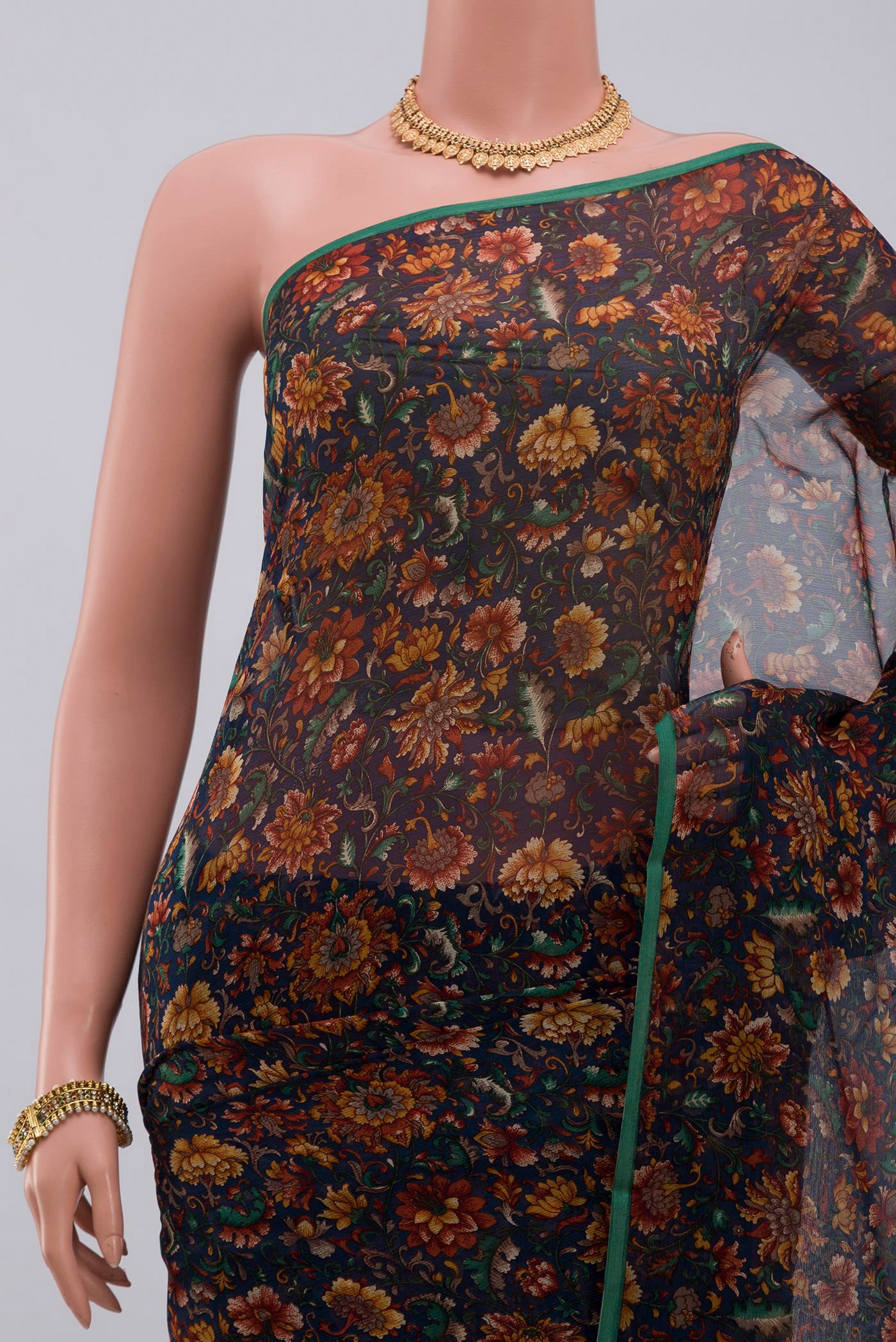 Border image of Blue Chiffon Saree with Printed design on the body and Without Border. 