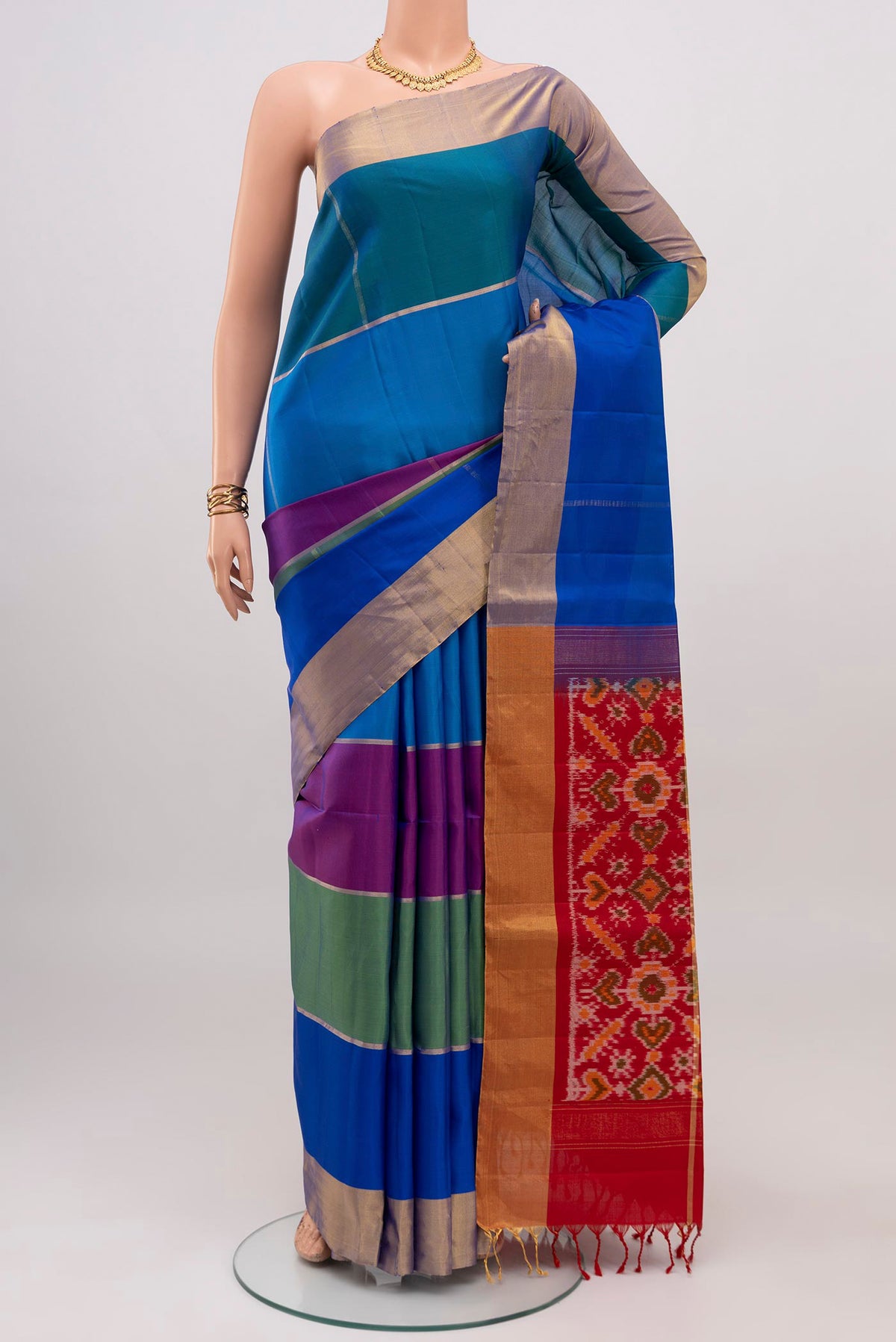 Multi Color Soft Silk Saree with Stripes on the body and Zari Border.  displayed on a mannequin