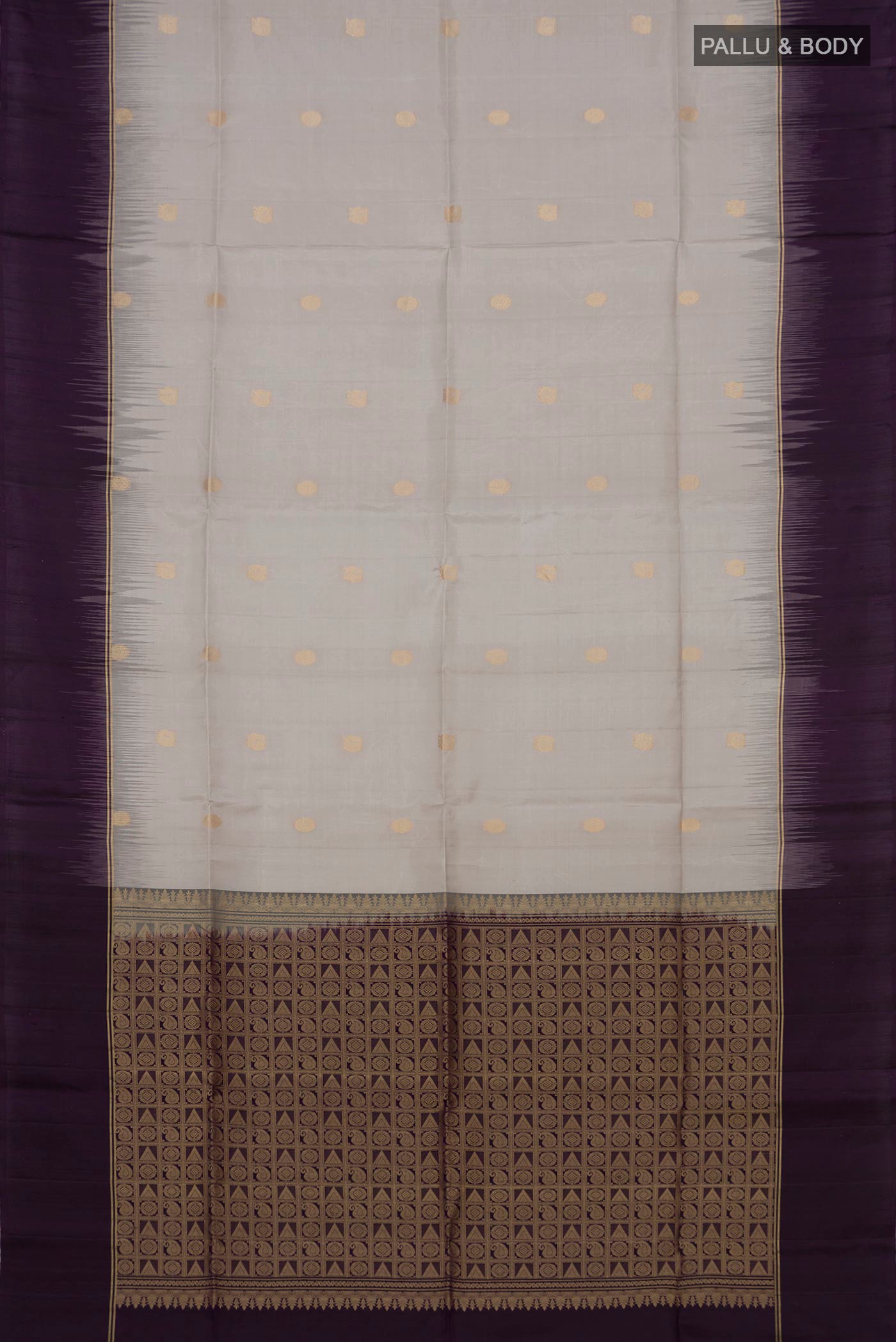 Flat view of Grey Soft Silk Saree with Zari Butta on the body and Plain Border. 